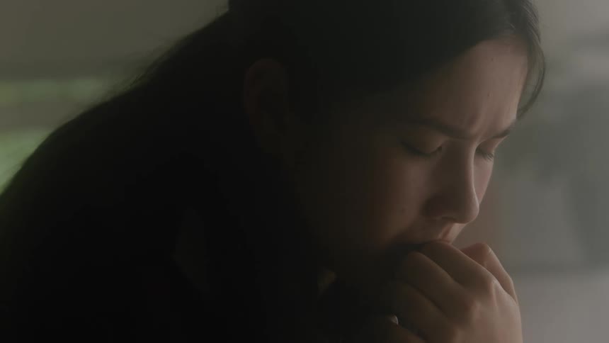 A woman is thinking about something