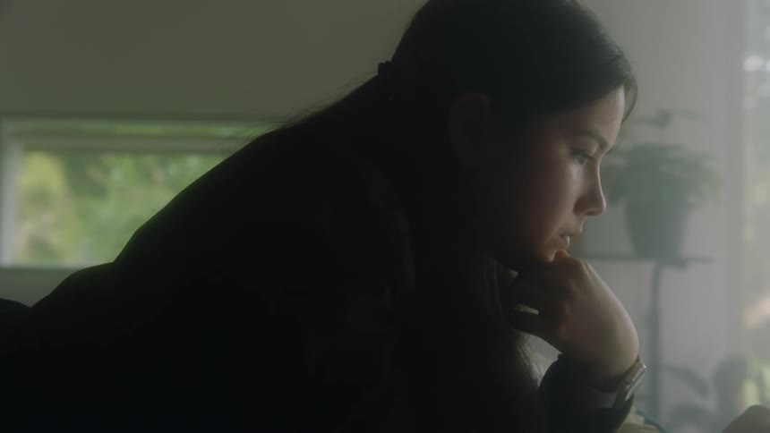 A woman is using her phone