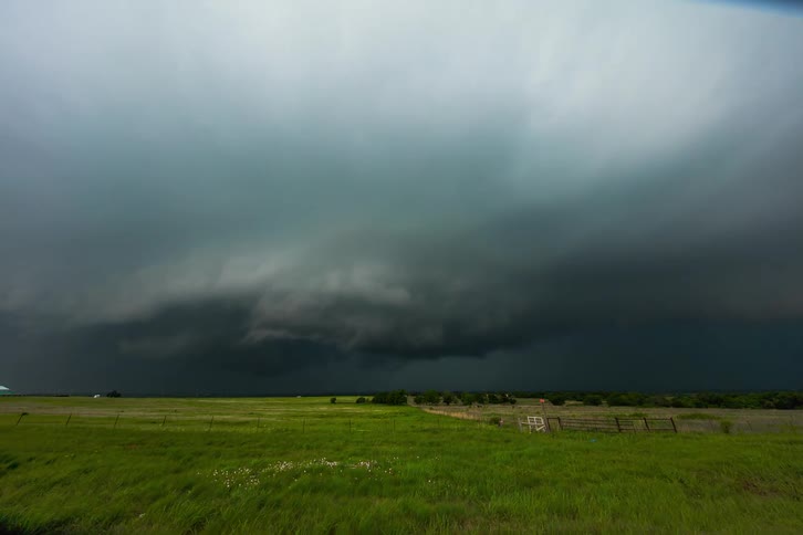 Clouds passing over an empty field