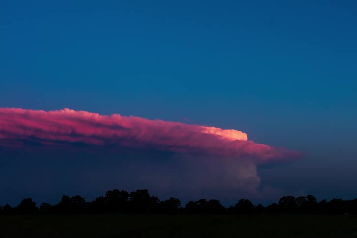 Clouds billowing in a sunset