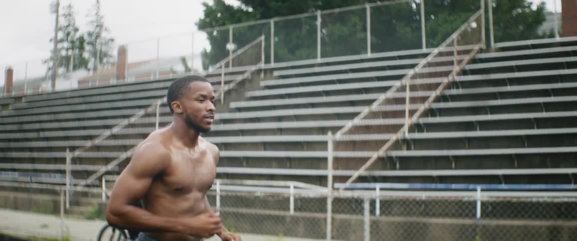 A man is running on the track