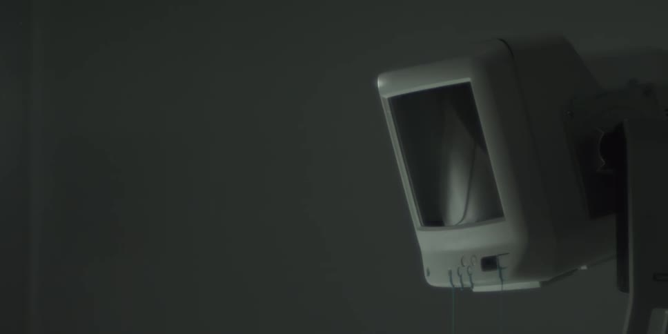 Blue liquid begins to ooze from a white monitor