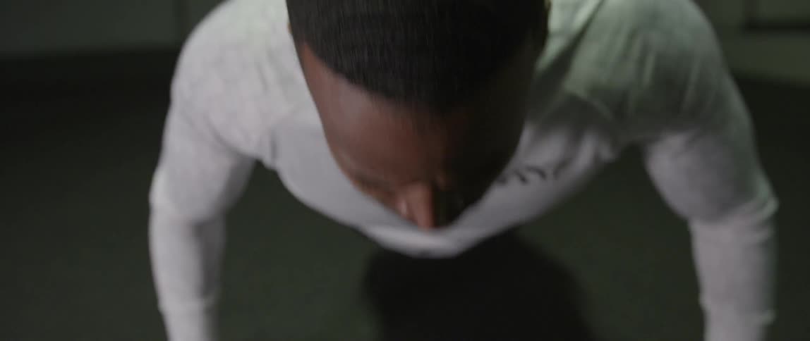 A man is doing push ups