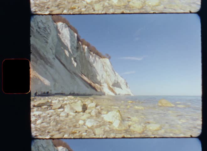 Large rocks line the shore