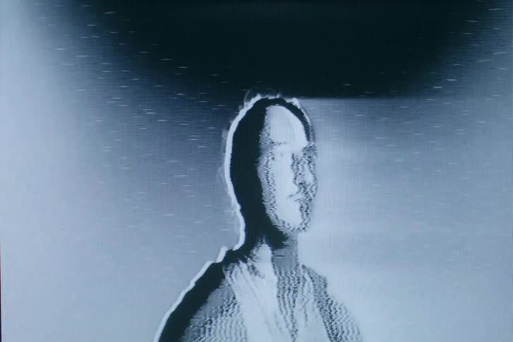 Broadcast signal flickers on screen distorting image of person
