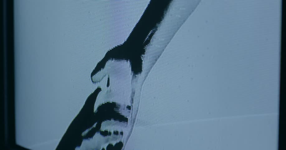 A hand is reaching out to hold another hand