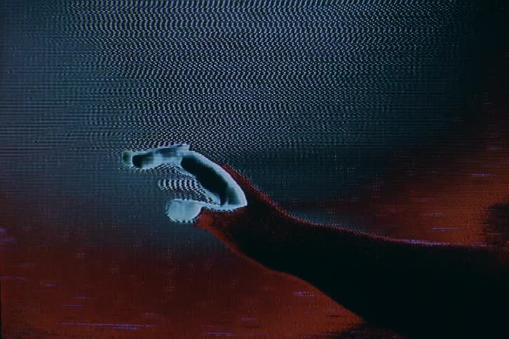 Broadcast signal static plays along hand