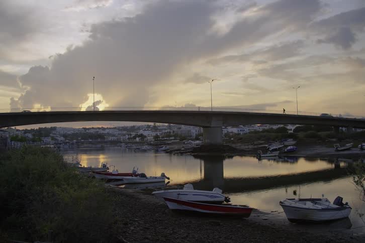 Cars pass over the bridge