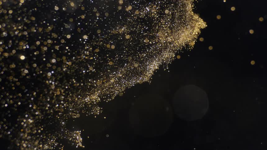 golden sparkling cloud moves in 3D space and shines