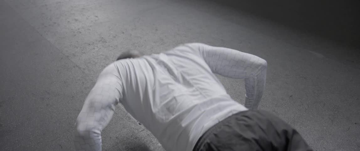 A man is doing push ups