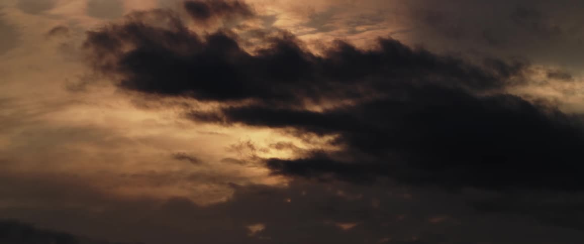 Large storm clouds cover the sky