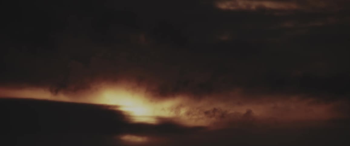 Black storm clouds fill the sky