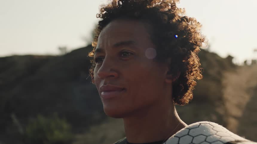 A woman is standing outside