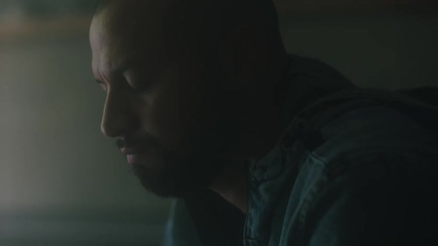 Introspective bearded man with a thoughtful facial expression