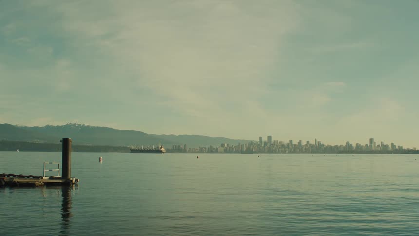 Early morning vista of a city skyline amid the mountains