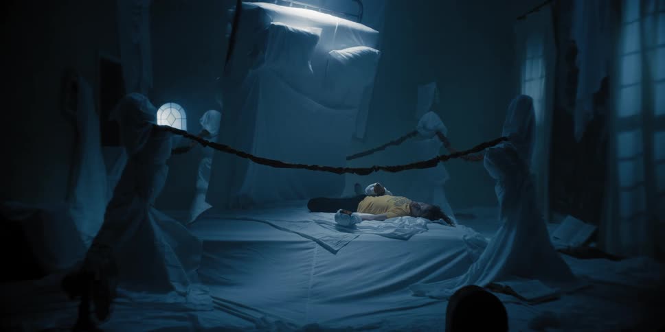 Man falling into a boxing ring with a standing bed almost falling into him