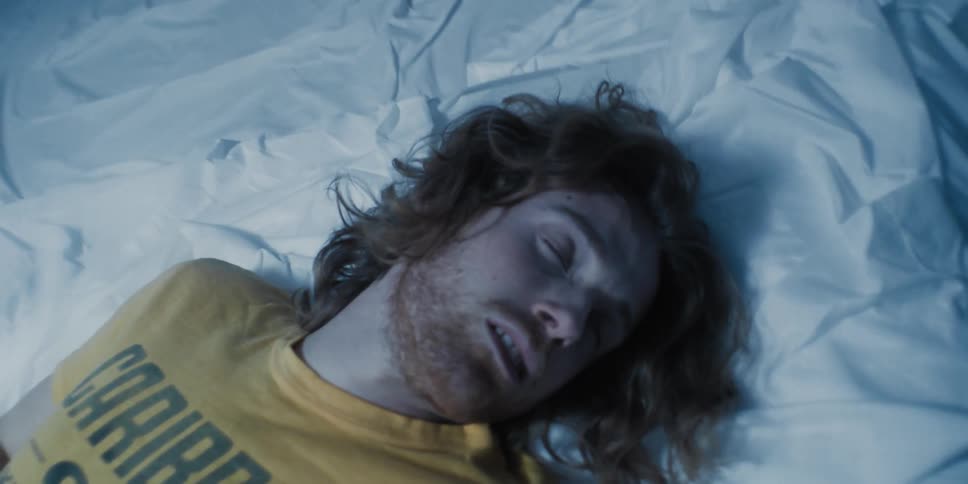 Man lying on a ring indoors
