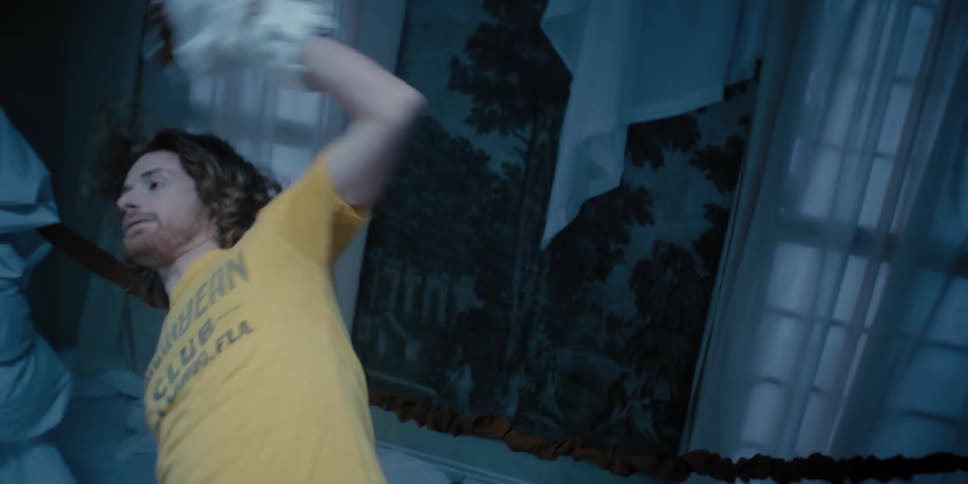 A man in a homemade boxing ring gets knocked down by the person behind the camera