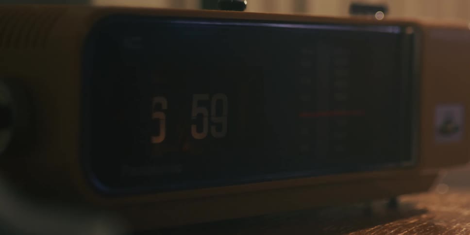 A retro clock changes from 659 to 700
