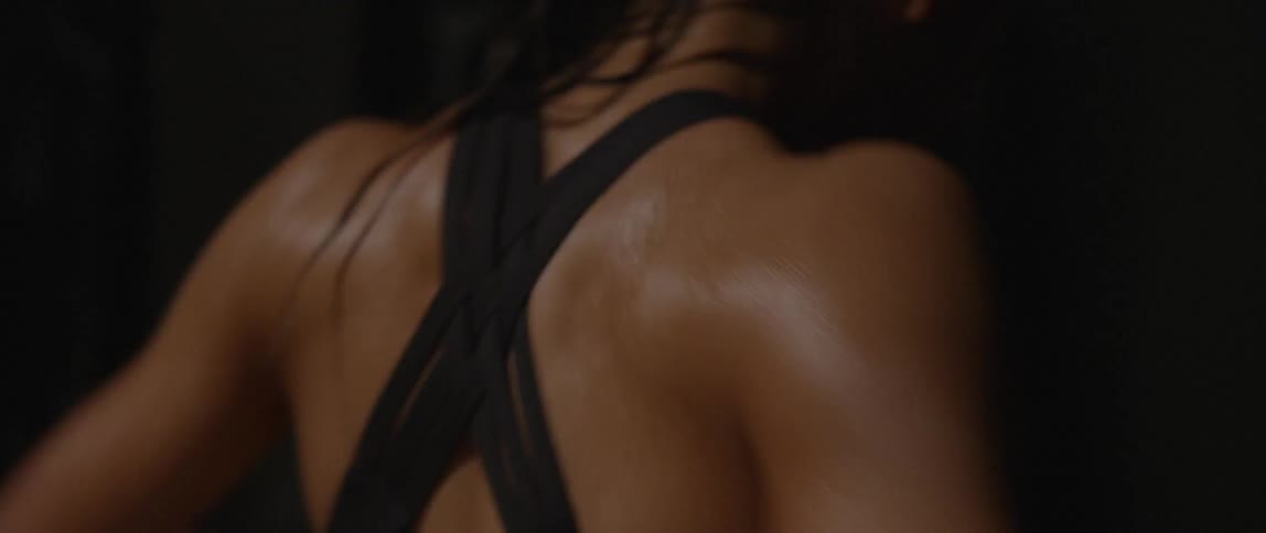 A woman is exercising sweating