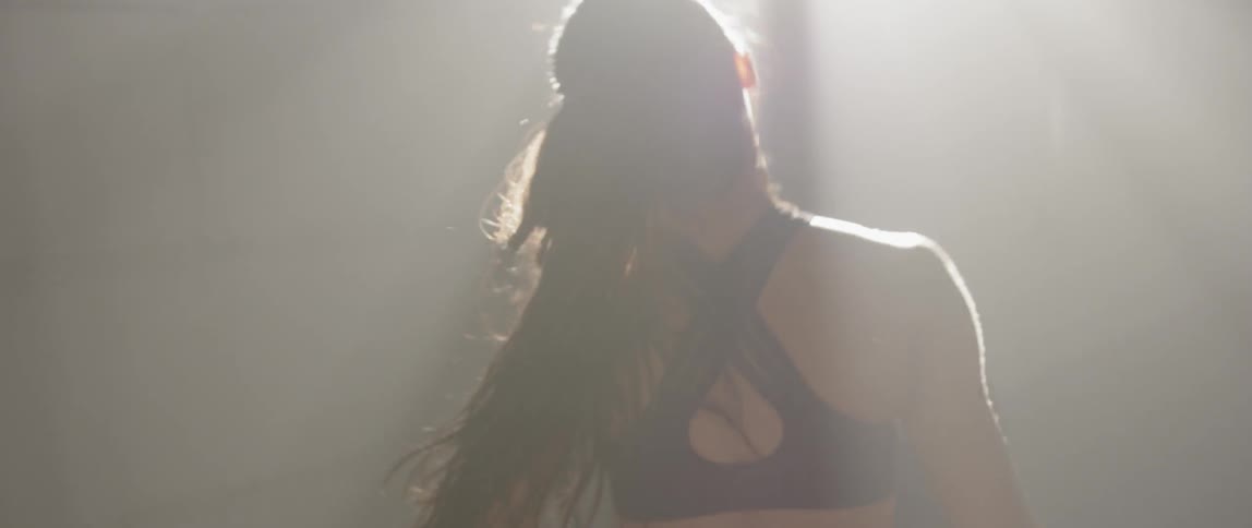 A woman walks stretching out