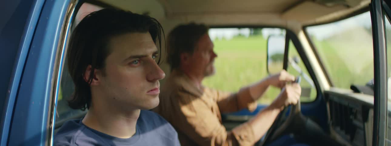Two people are driving together