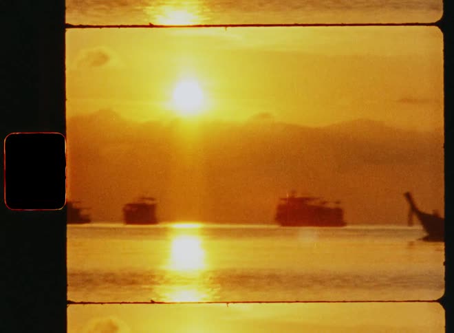 Old film footage of boats on the ocean