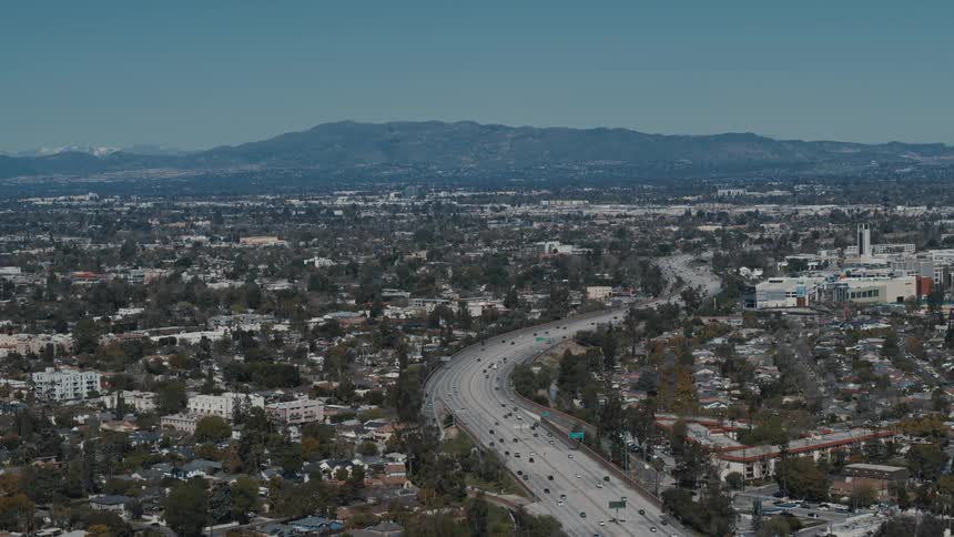Traffic moves along the 101 Freeway in Studio City, California