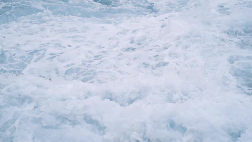 Close up view of ocean waves moving quickly
