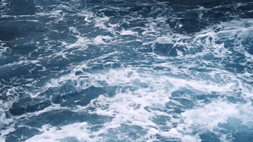 Close up view of ocean waves are displayed