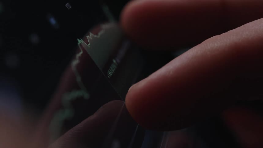 A person is touching their tablet