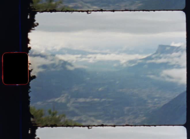 A valley lies between the mountains