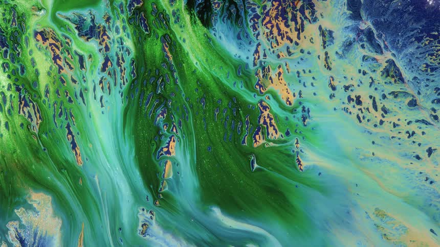 a waterfall of golden and green liquid on an earthy background