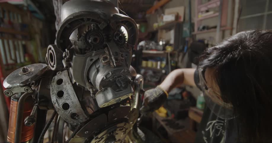 A man is building a robot