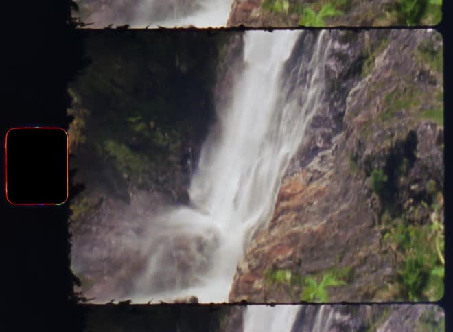 Natural landscape with waterfall on a mountain with forest