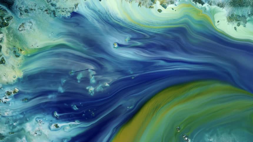 a blue stream of water and paint flows across the scene