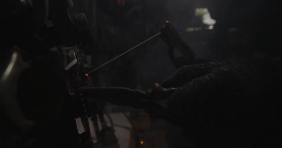 A person is welding in the workshop