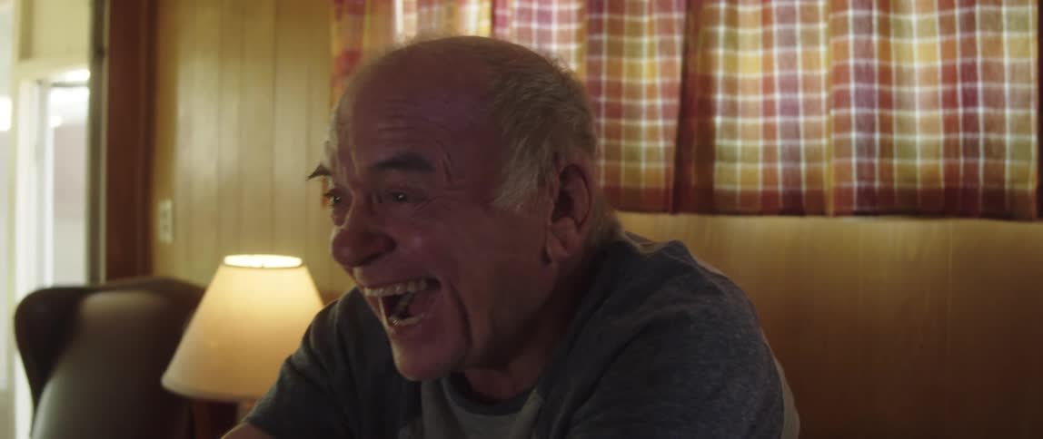 A man gets up and cheers