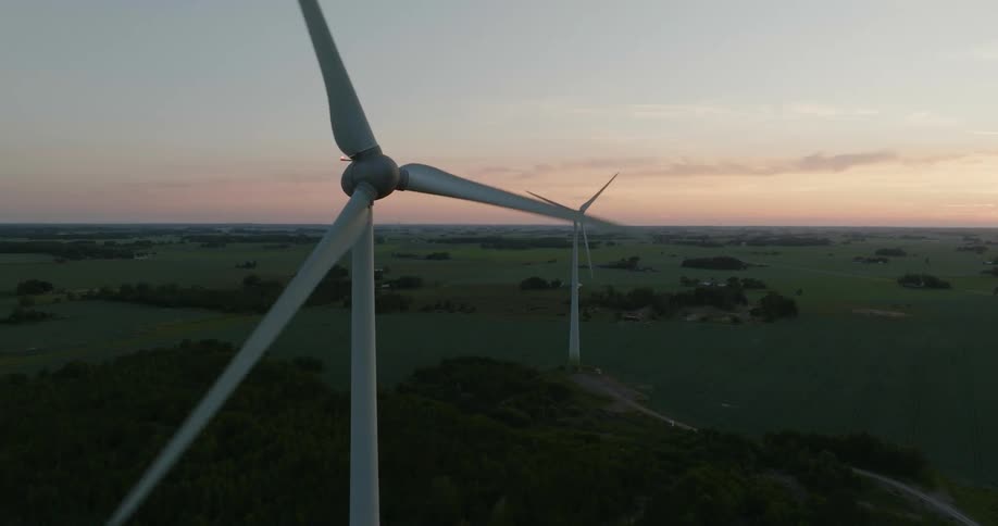 The windmills keep turning on the field