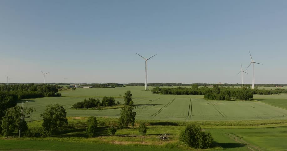 Wind turbines on a wind farm in a grassland on a clear day