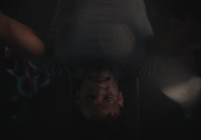A man is bench pressing