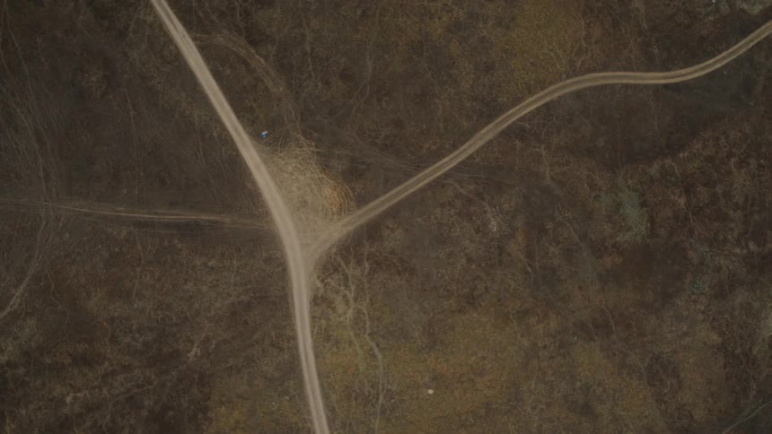 From high above a road can be see branching off from another