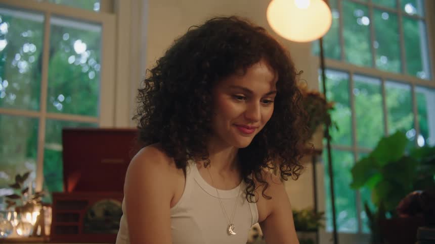 Woman smiling indoors