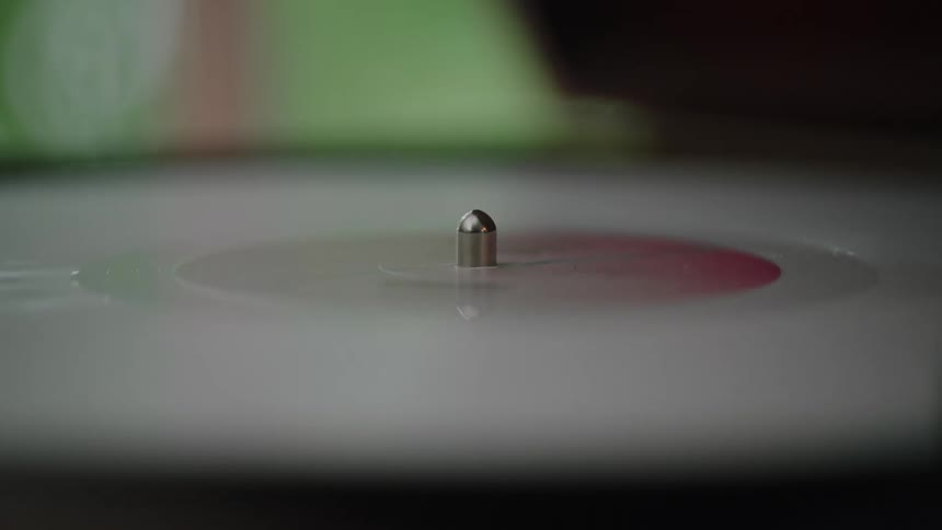 The record slowly spins