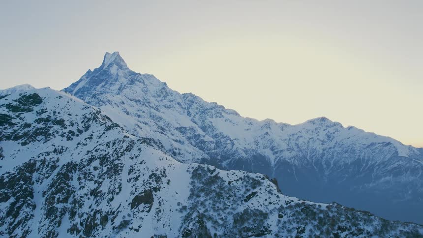 A mountain with rough terrain in winter