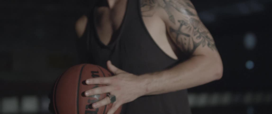 A man is holding a basketball