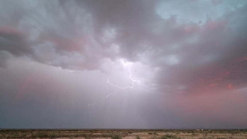 Lightning flashes across a dark sky during a storm