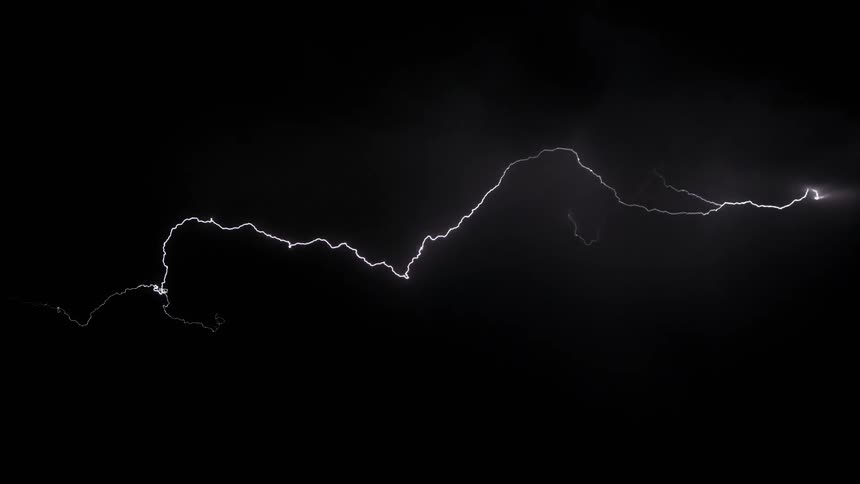 Lightning strike in the dark night creating curved lines in the sky