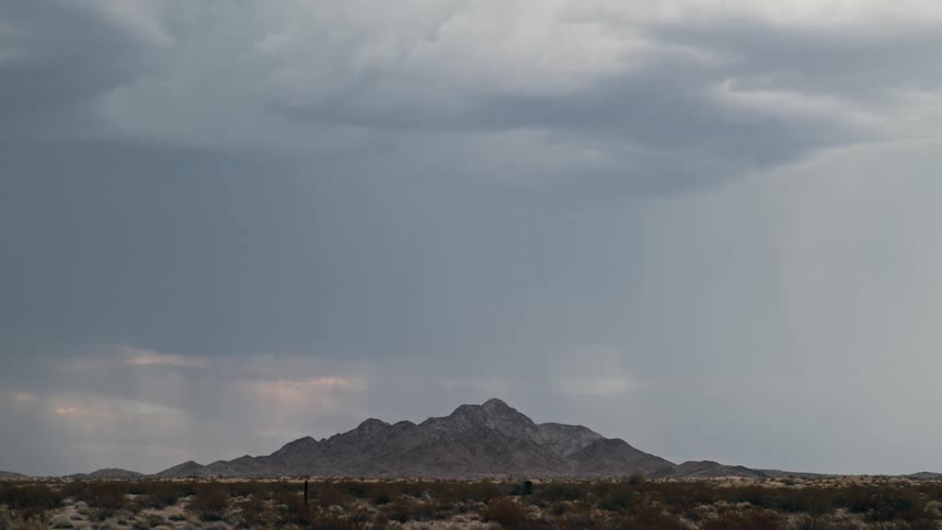 Lightning strike over a mountain in the desert