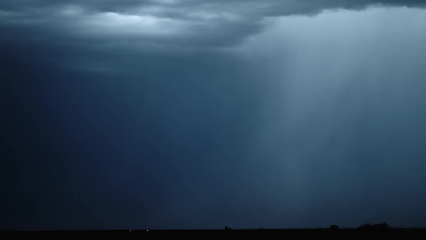 Thunderstorm and lightining over the countryside at night